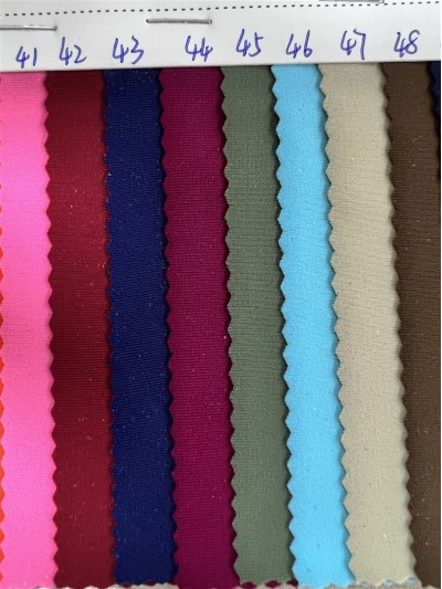 DG-BT recycled nylon matte Lycra Composition: 82% recycled nylon 18% spandex Weight: 200g/㎡ Width: 150CM detail view-3 DG-BT recycled nylon matte Lycra Composition: 82% recycled nylon 18% spandex Weight: 200g/㎡ Width: 150CM detail view-3